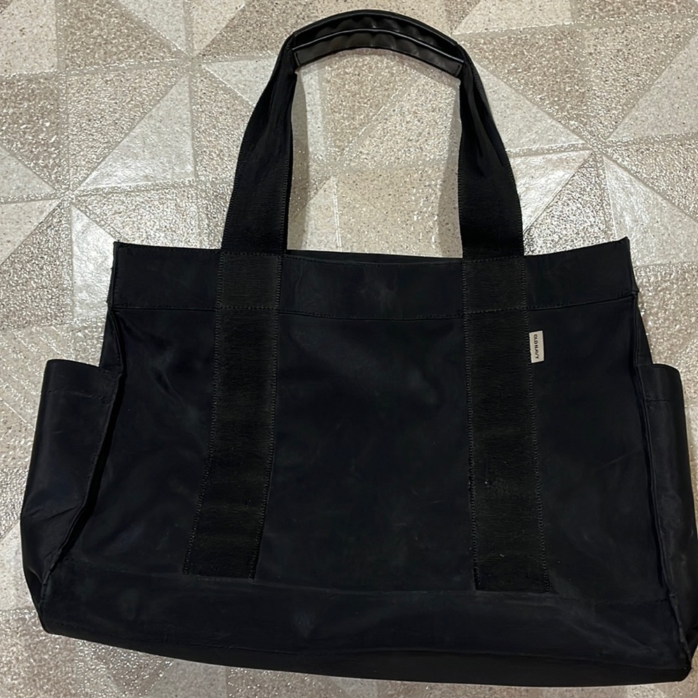 Old Navy Black nylon tote bag. Great pockets and compartments. Sturdy Strap - Picture 5 of 12
